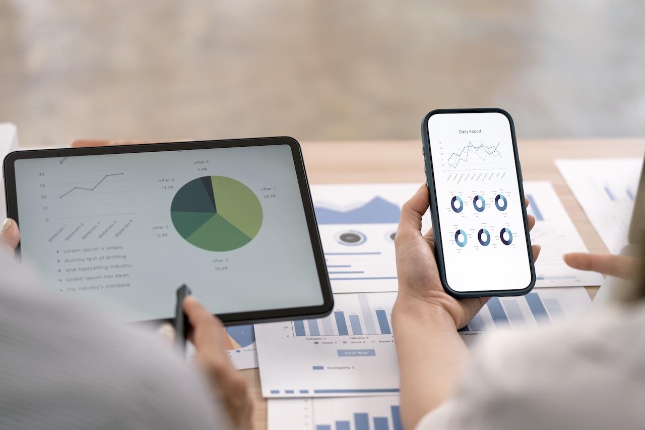 Phone and tablet showing a business app interface